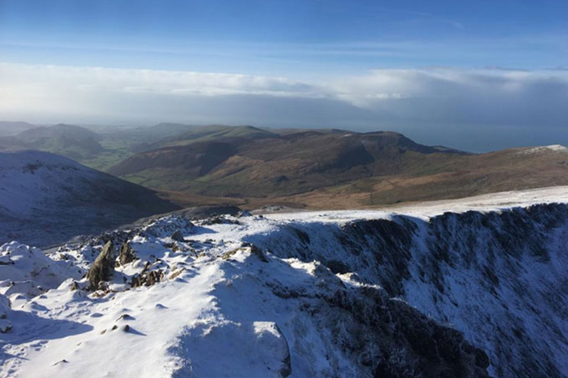 4 more mountains takes Charles to his climbing summit